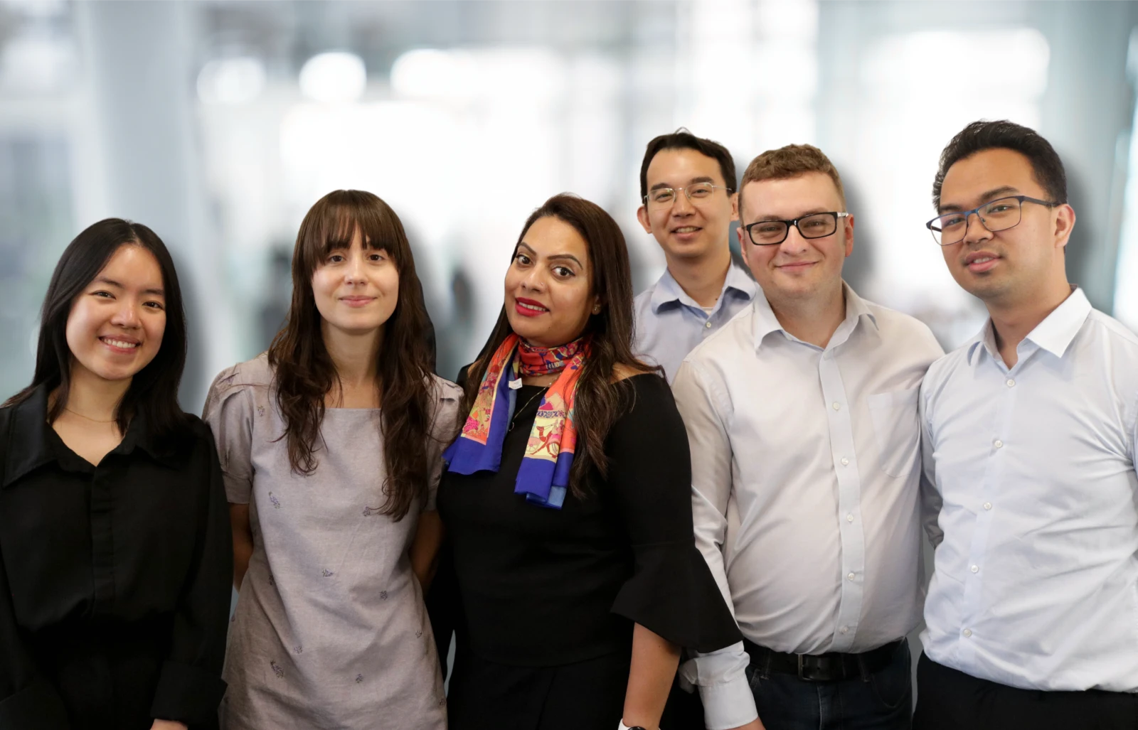 Our BD team stood with our Notary Public of England and Wales.